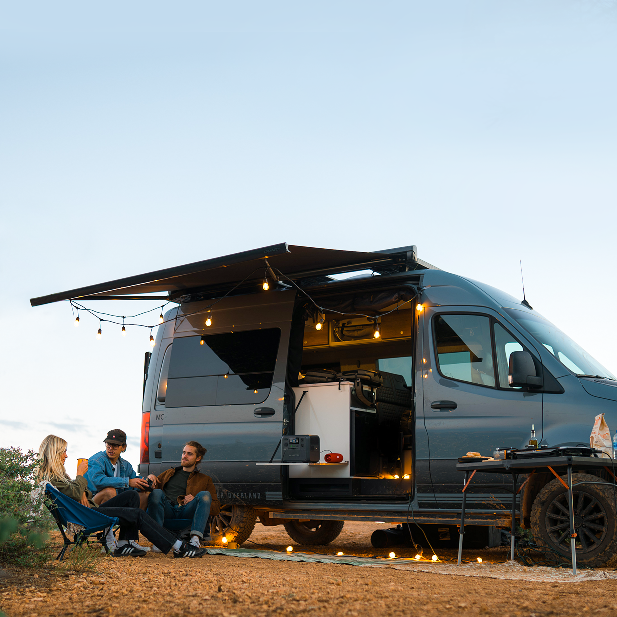 BLUETTI AC70 in use at a campsite with vehicle